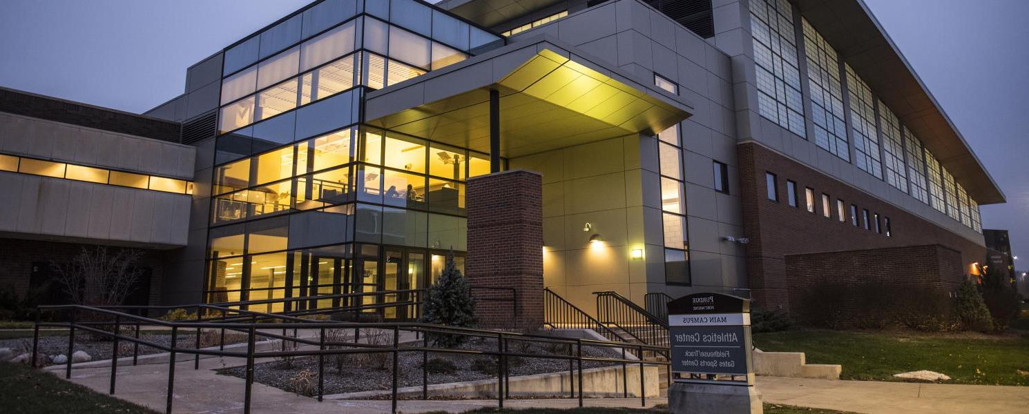 Athletics Center at dusk on campus.