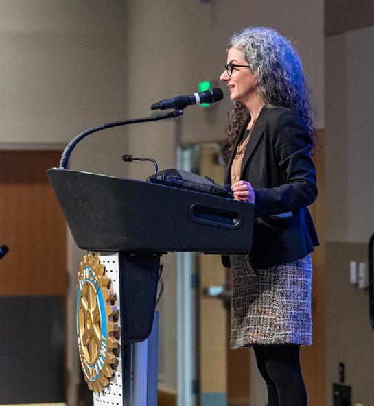 Janet Badia, dean of the College of Liberal Arts, speaks to high school students at the Fort Wayne Rotary Club's Peace and Conflict Resolution conference 