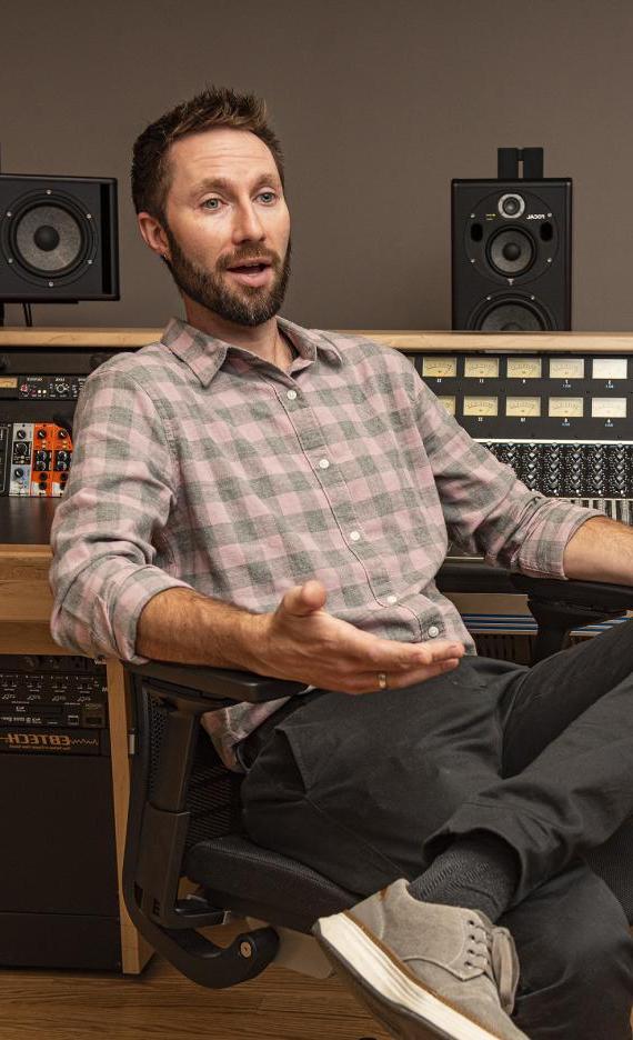 John Buteyn is sitting in a recording studio